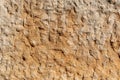 Texture of a natural rough-cut stone of an ancient building Royalty Free Stock Photo