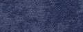 Texture of navy blue background from soft fluffy upholstery textile material, macro. Abstract dark denim fabric Royalty Free Stock Photo