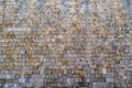 Texture of an old and ancient stone wall Royalty Free Stock Photo