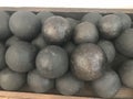 Texture of old antique combat round gray metallic, iron, stone cannon balls, ammunition. The background Royalty Free Stock Photo