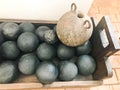 Texture of old antique combat round gray metallic, iron, stone cannon balls, ammunition. The background Royalty Free Stock Photo