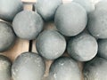 Texture of old antique combat round gray metallic, iron, stone cannon balls, ammunition. The background Royalty Free Stock Photo