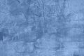 Texture of old blue painted wall, chipped, scratches. Stucco wall. Natural vintage background Royalty Free Stock Photo