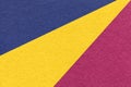 Texture of old craft navy blue, yellow and purple color paper background, macro. Vintage abstract cardboard Royalty Free Stock Photo