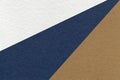 Texture of old craft white, navy blue and brown color paper background, macro. Structure of vintage abstract cardboard Royalty Free Stock Photo