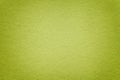 Texture of old green paper background, closeup. Structure of dense light olive cardboard Royalty Free Stock Photo