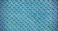 Old metal diamond plate covered with blue paint Royalty Free Stock Photo