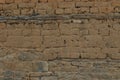 Texture of old mud wall with bricks and stones Royalty Free Stock Photo