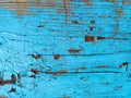 texture of old painted shabby rustic wooden fence made of planks, with rusty nails, grunge background Royalty Free Stock Photo