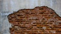 Texture of old red brick wall. Grunge background brick wall. Painted rough wall surface. Shabby building facade with damaged Royalty Free Stock Photo