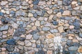 Texture of old rock wall for background. A castle wall of multicolored stones or blocks. Stacked stone wall Royalty Free Stock Photo