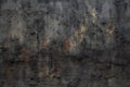 Texture of old rustic wall covered with gray and yellow stucco Royalty Free Stock Photo