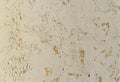 Texture of old rustic wall covered with yellow stucco Royalty Free Stock Photo