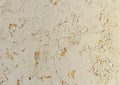 Texture of old rustic wall covered with yellow stucco Royalty Free Stock Photo