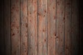 The texture of an old rustic wooden fence made of flat processed boards. Detailed image of a street fence of a rustic type made o