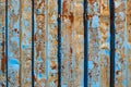 Texture of old rusty corrugated metal surface with peeling blue paint Royalty Free Stock Photo