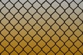 Texture of an old and rusty metal mesh on a neutral colored back Royalty Free Stock Photo