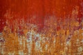 Texture of old rusty metal, painted red which becames orange from rust Royalty Free Stock Photo