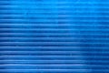 Texture of an old scratched blue polycarbonate honeycomb panel