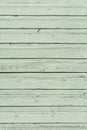 The texture of old scratched green wooden planks. Old painted wood wall texture. Royalty Free Stock Photo