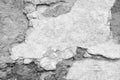 Texture of old stone wall with collapsed plaster. Background of shabby building surface. Destroyed stone wall with fallen plaster Royalty Free Stock Photo