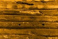 The texture of old stripped boards. The wall of the house. In a fiery black color