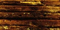 The texture of old stripped boards. The wall of the house. In a fiery black color