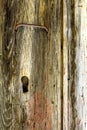 Texture of old vertical wooden planks with lock and handle Royalty Free Stock Photo
