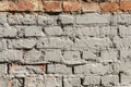 Texture of the old wall of brick blocks, scattered brick and brickwork, architecture abstract background Royalty Free Stock Photo