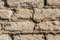 Texture of the old wall of brick blocks, scattered brick and brickwork, architecture abstract background Royalty Free Stock Photo