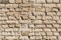 Texture of the old wall of brick blocks, scattered brick and brickwork, architecture abstract background Royalty Free Stock Photo