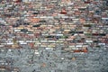 Brick wall of colored bricks and cement Royalty Free Stock Photo