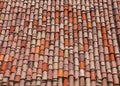 Texture of old weathered red and orange roof tiles. Royalty Free Stock Photo