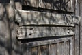 Texture old wood board, door, window of a barn, windows are boarded up, the old house, boarded up house Royalty Free Stock Photo