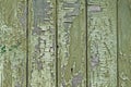 Texture of old wooden boards with green cracked paint, vintage background Royalty Free Stock Photo