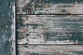 Texture of old wooden grey and green painted planks with peeling paint closeup Royalty Free Stock Photo