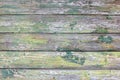 Texture of old wooden grey and green painted planks with peeling paint closeup Royalty Free Stock Photo