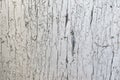 Texture of old wooden white wall with cracking paint
