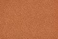 The texture of orange acrylic plaster - freshly plastered wall Royalty Free Stock Photo