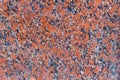 Texture of orange stone wall with granite crumb