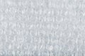 The texture of the packaging air-bubble film on a White background in full screen Royalty Free Stock Photo