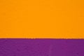 Texture painted wall in yellow and purple Royalty Free Stock Photo