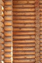 Texture parallel folded treated timber. Ancient technology building of Russian log hut, wood house cottages and churches Royalty Free Stock Photo