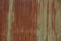 Texture from part of an old green metal wall in brown rust Royalty Free Stock Photo