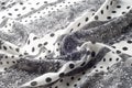 Texture, pattern, background. Cloth cotton. White fabric, painted with black polka dots, black lace. Black White Grunge Spots Fab Royalty Free Stock Photo
