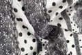 Texture, pattern, background. Cloth cotton. White fabric, painted with black polka dots, black lace. Black White Grunge Spots Fab Royalty Free Stock Photo