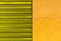 Texture pattern of purpple iron door of closed store and yellow wall