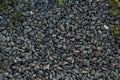 The texture pattern of several scattered gravels covering the ground. Royalty Free Stock Photo