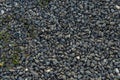 The texture pattern of several scattered gravels covering the ground. Royalty Free Stock Photo