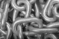 Texture, pattern. solid anodized chain. A number of metal bonds, one to the other. linked flexible series of metal links used for Royalty Free Stock Photo